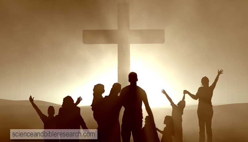 Silhouette of family at the cross of Jesus (Photo by Balazs)