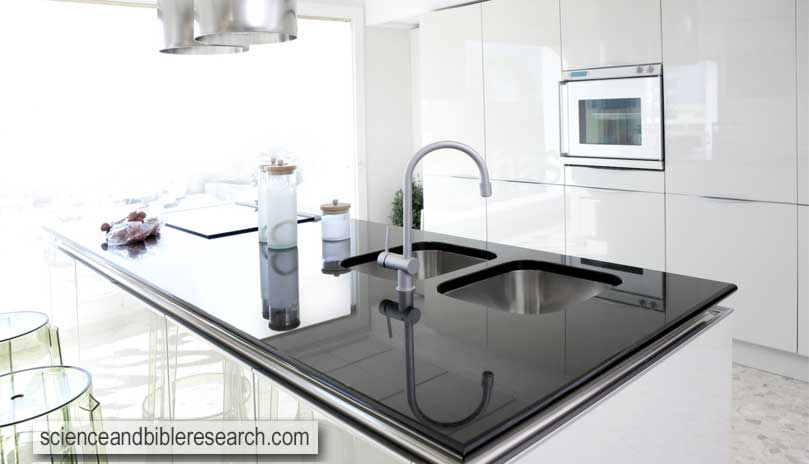 Modern white kitchen, clean interior design, deco architecture (Photo by lunamarina)