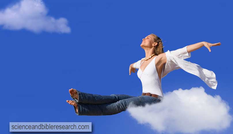 Woman floating on a cloud (Photo by mandygodbehear)